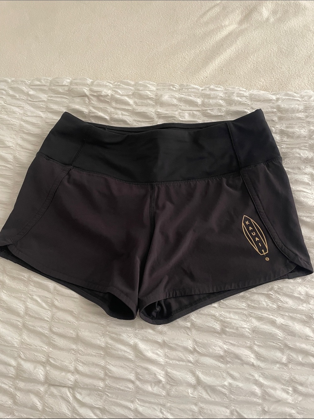 Size 4 lululemon black shorts - Kauai special logo